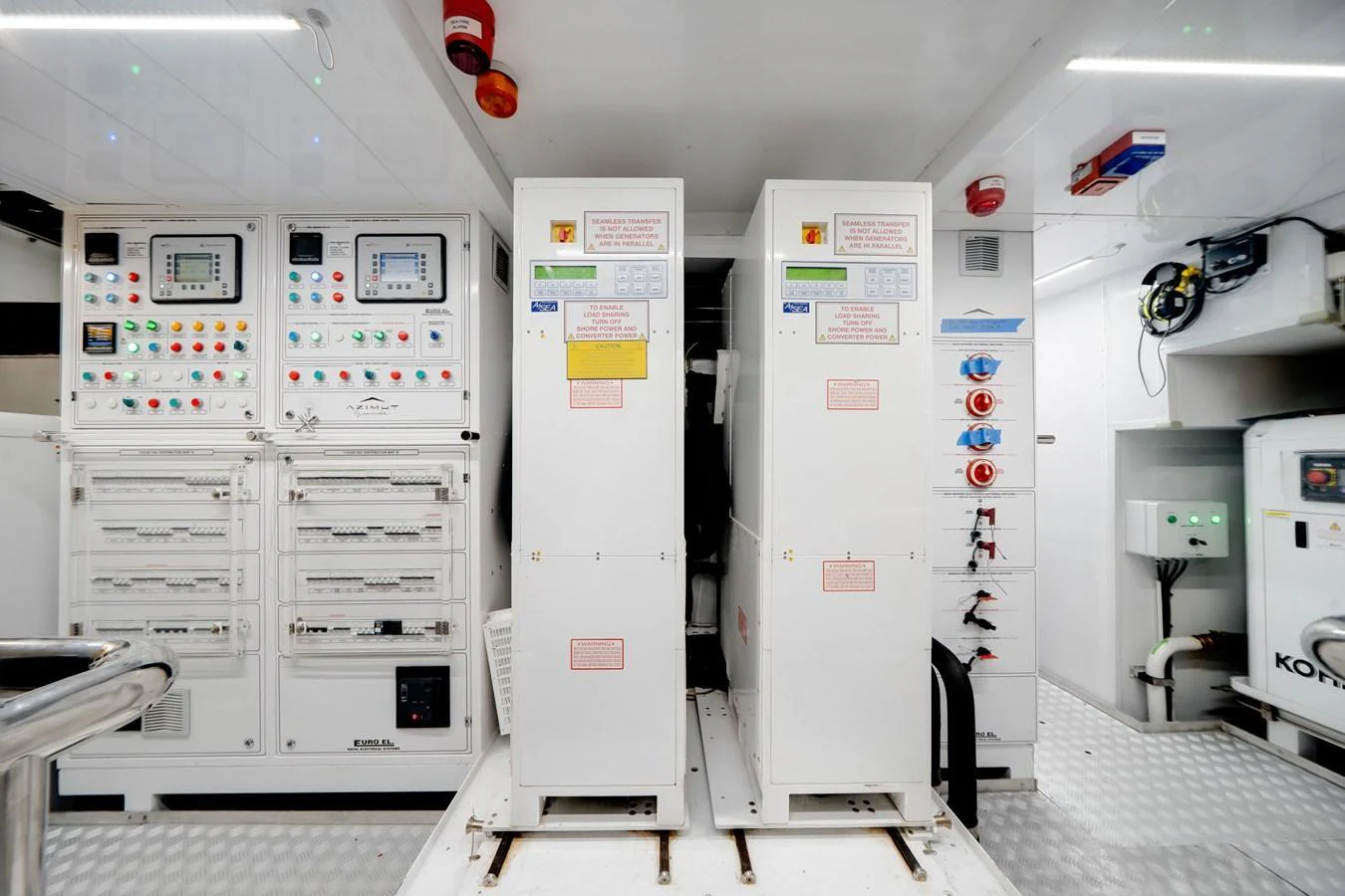 The image showcases the yacht's well-equipped engine room with advanced control panels and machinery. aboard TYCOON Yacht for Sale