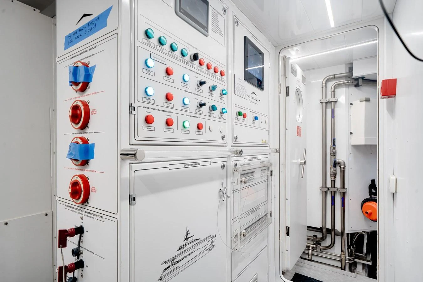 The yacht's engine room features a well-organized control panel with various switches and indicators. aboard TYCOON Yacht for Sale
