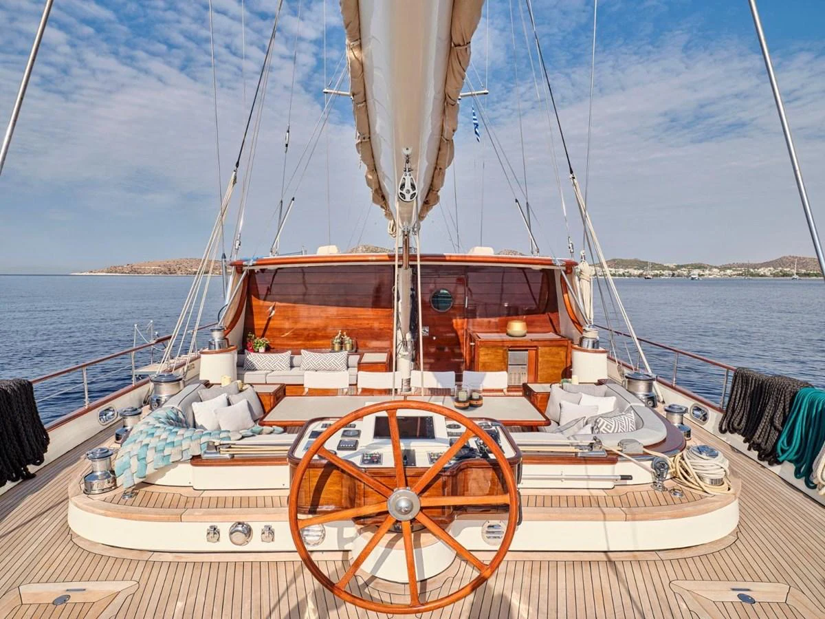 a boat with a cannon on it aboard PASA Yacht for Sale