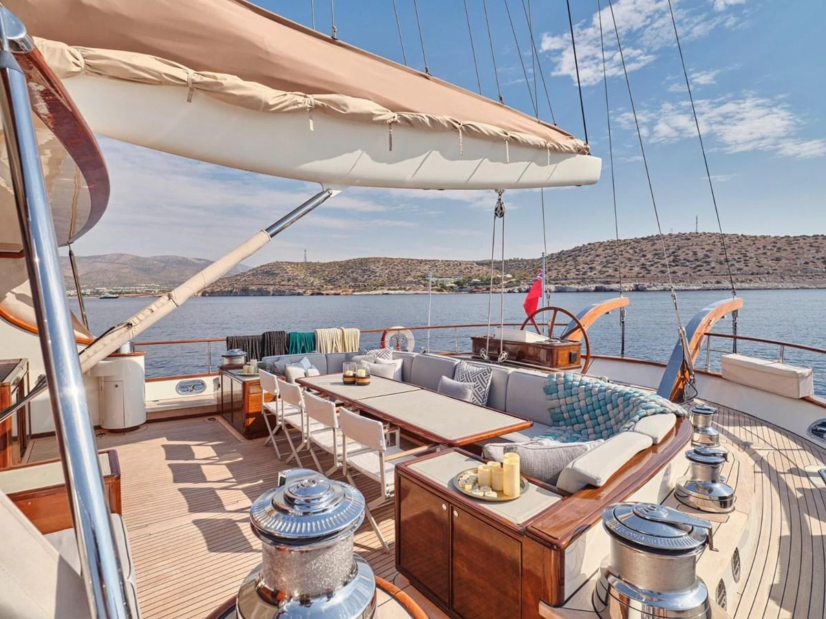 a deck with a view of a city and water aboard PASA Yacht for Sale