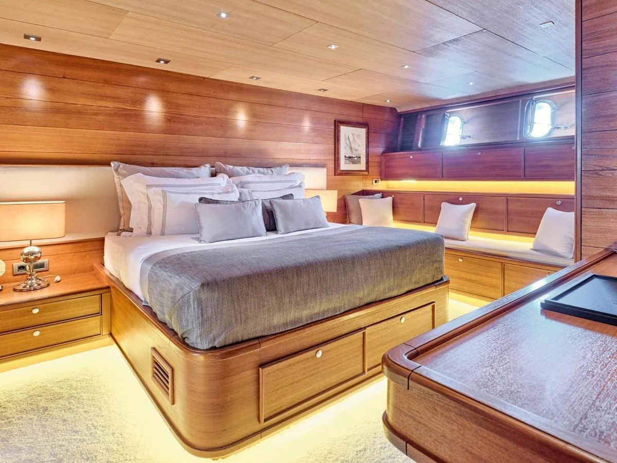 a bed in a room aboard PASA Yacht for Sale