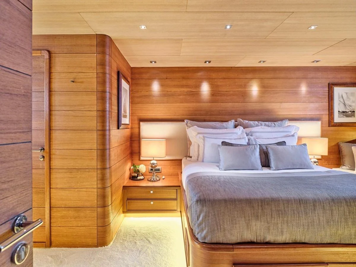 a bed in a room aboard PASA Yacht for Sale