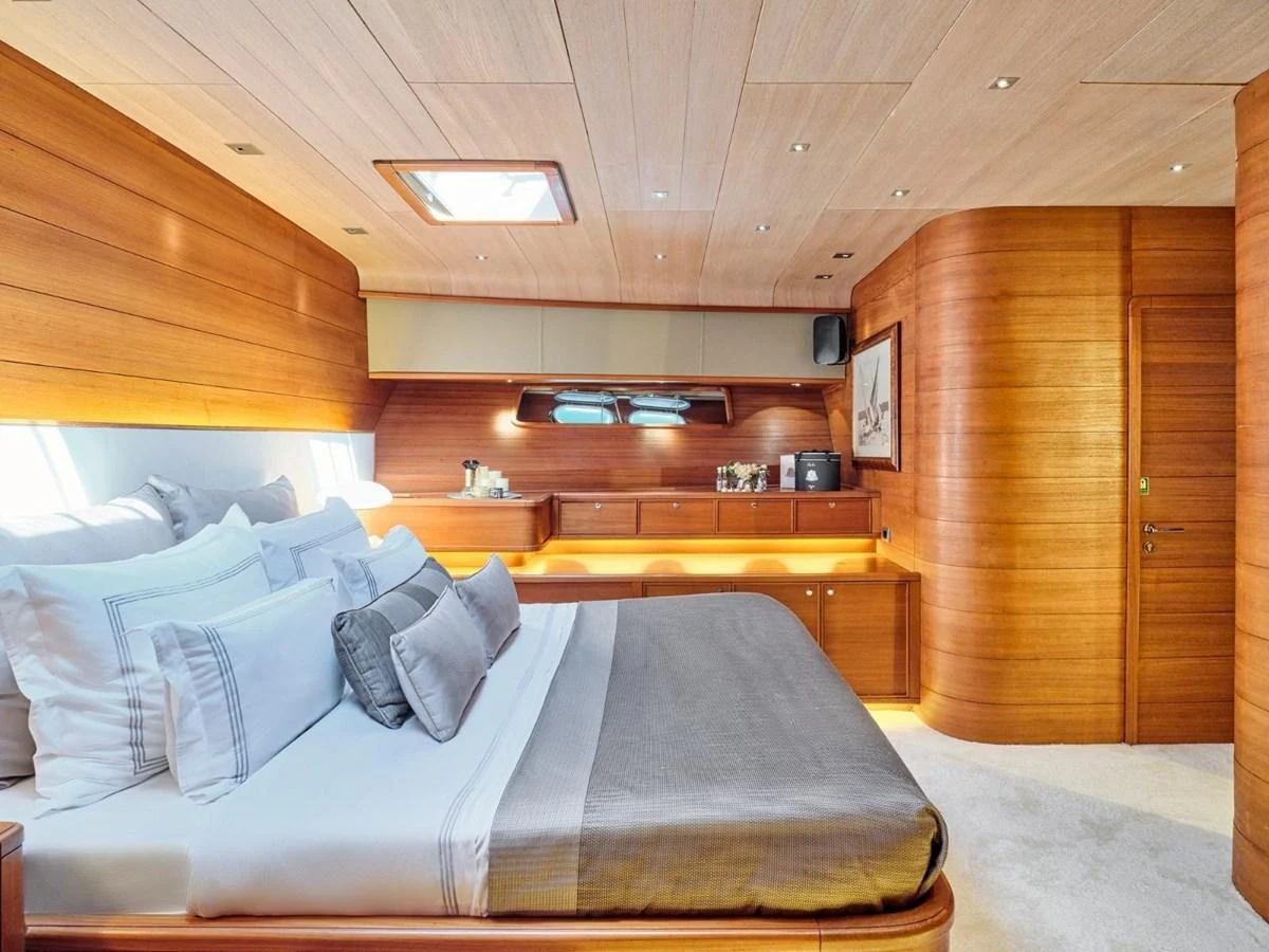 a bed in a cabin aboard PASA Yacht for Sale