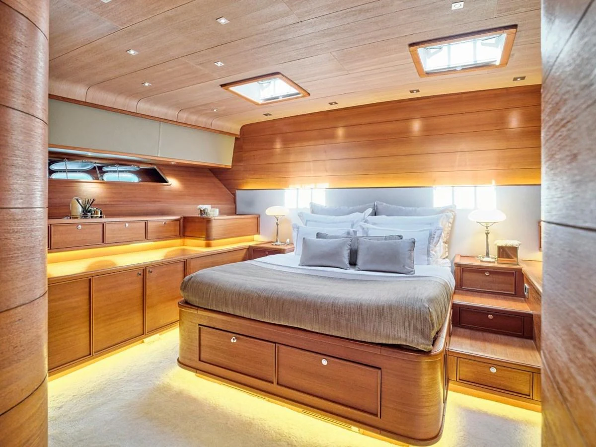 a bed in a room aboard PASA Yacht for Sale