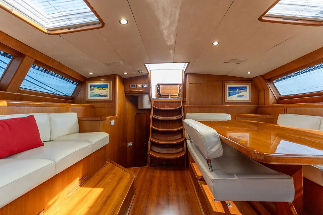 a room with a couch and a table aboard SKIP'N BOU Yacht for Sale