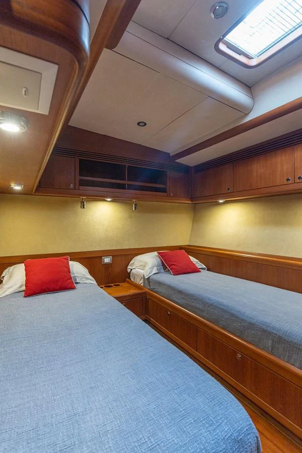 a room with two beds aboard SKIP'N BOU Yacht for Sale