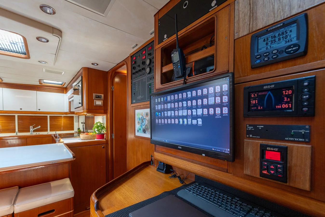 a room with a computer and a desk aboard SKIP'N BOU Yacht for Sale