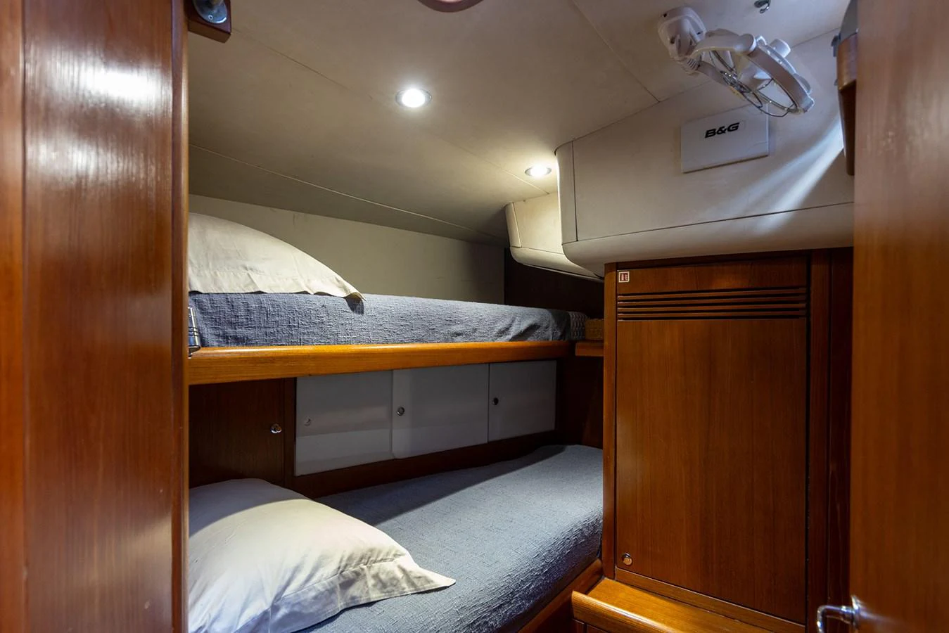 a room with bunk beds aboard SKIP'N BOU Yacht for Sale