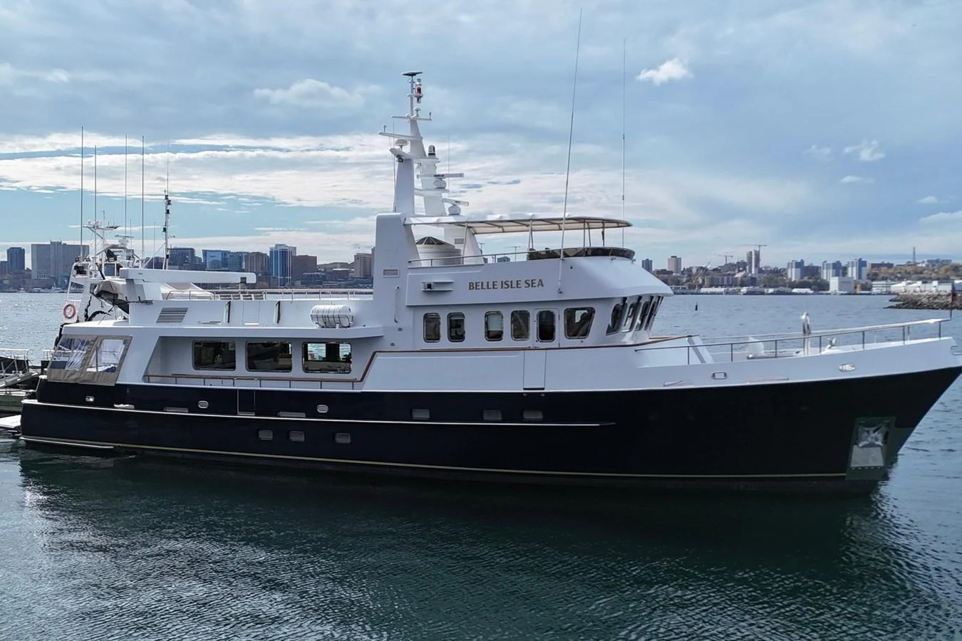 a large white boat in the water aboard BELLE ISLE SEA Yacht for Sale