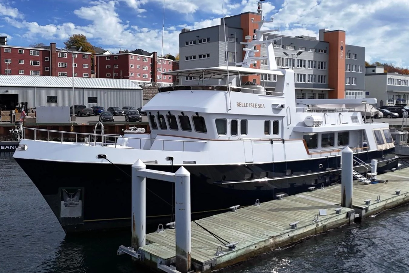 a large white boat docked aboard BELLE ISLE SEA Yacht for Sale