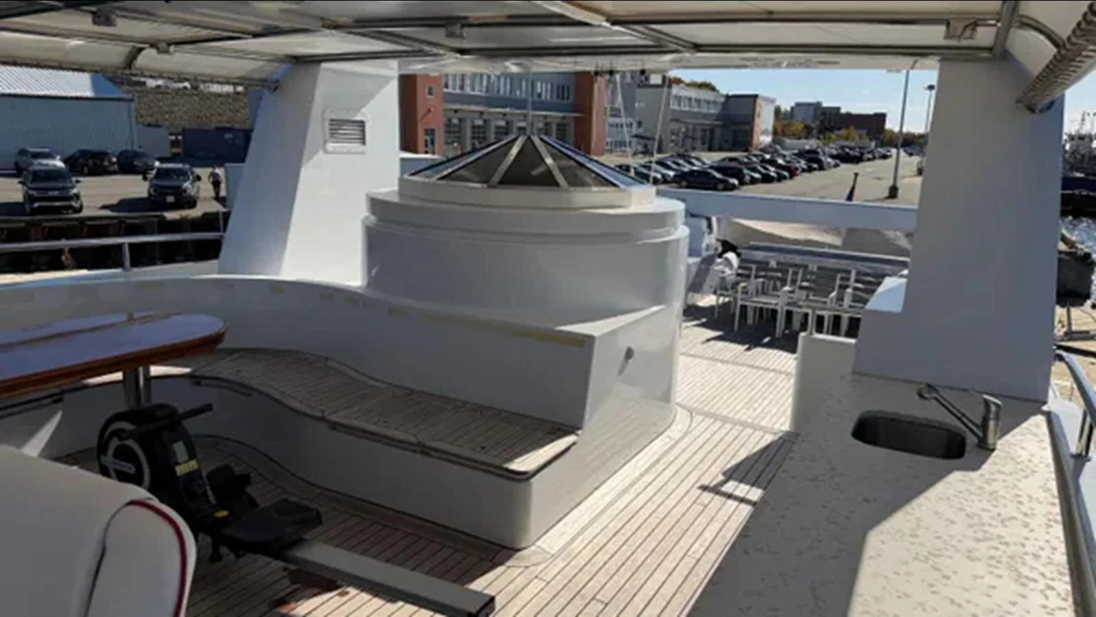a large white machine in a parking lot aboard BELLE ISLE SEA Yacht for Sale