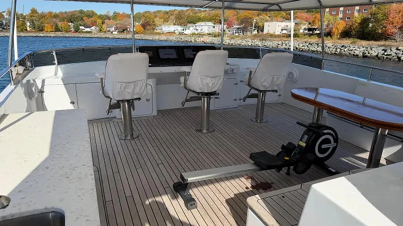 a table and chairs on a deck aboard BELLE ISLE SEA Yacht for Sale