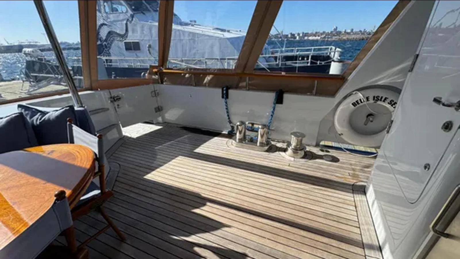 a deck with a large window aboard BELLE ISLE SEA Yacht for Sale