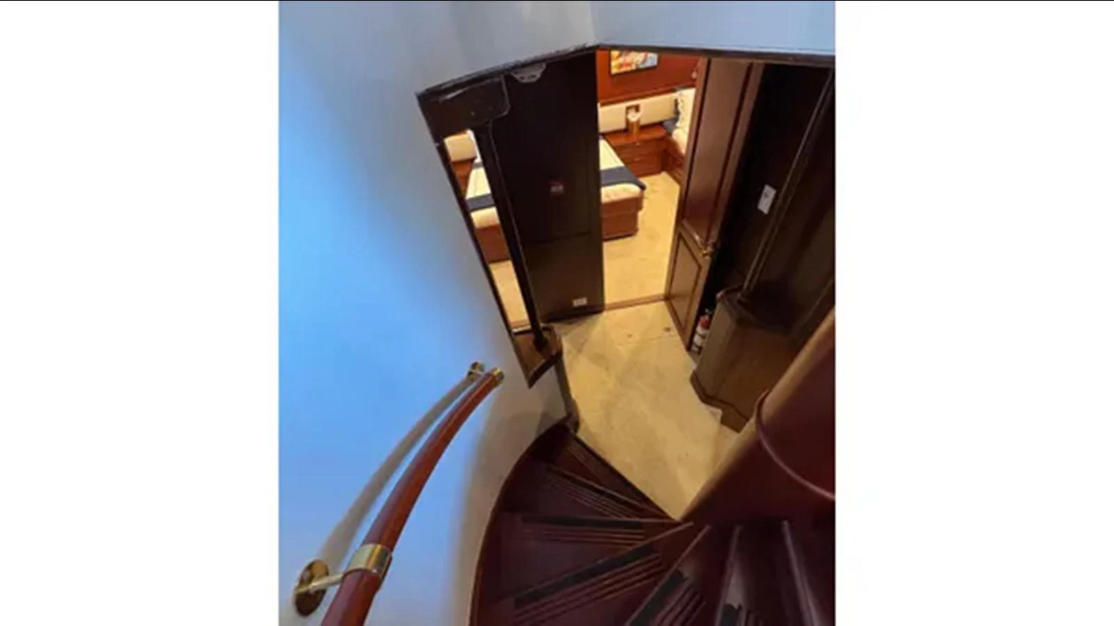 a black and white photo of a black piano and a black piano aboard BELLE ISLE SEA Yacht for Sale