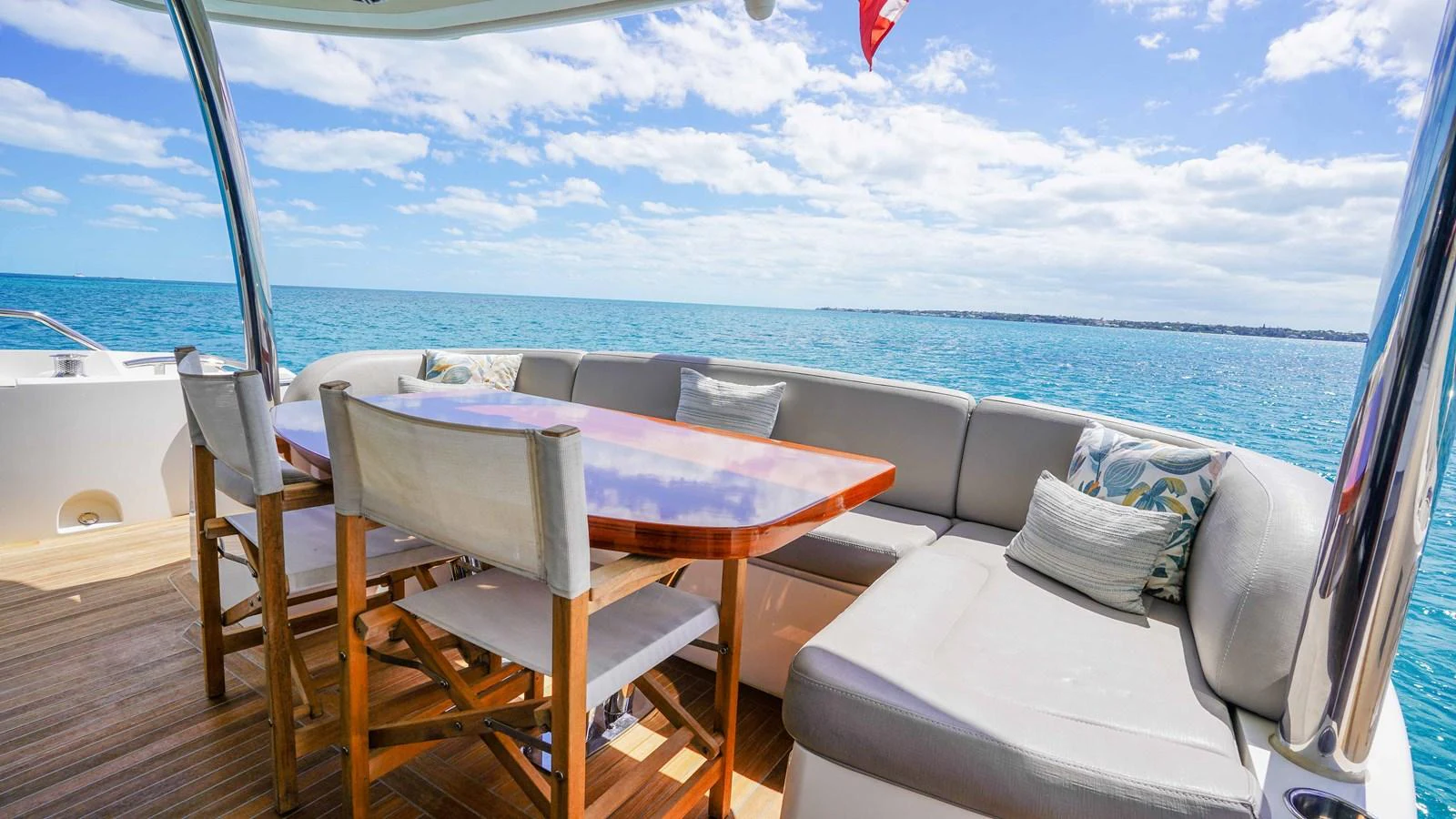 a table and chairs on a boat aboard DADDY'S $ Yacht for Sale