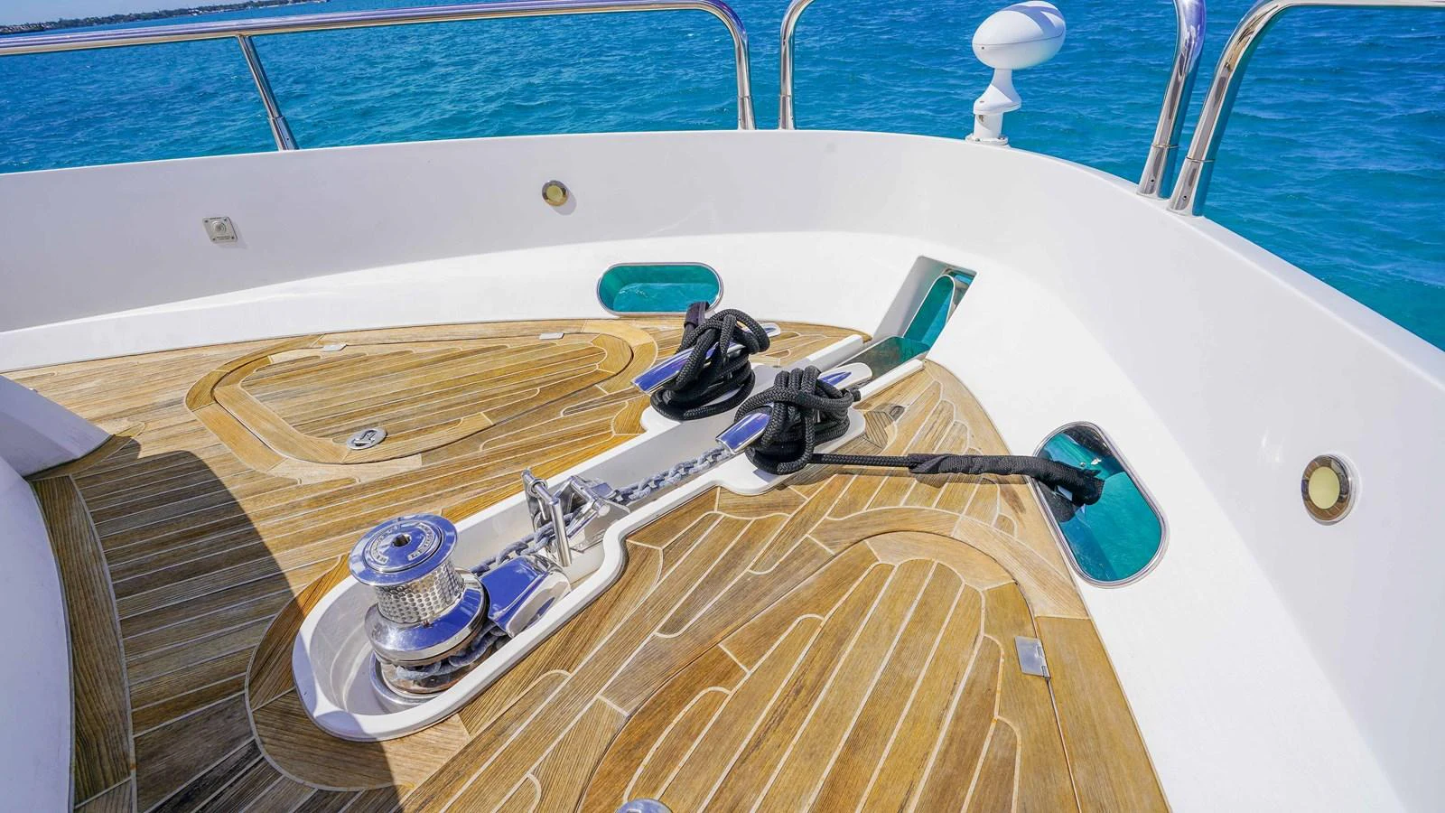 a wooden boat with a steering wheel aboard DADDY'S $ Yacht for Sale