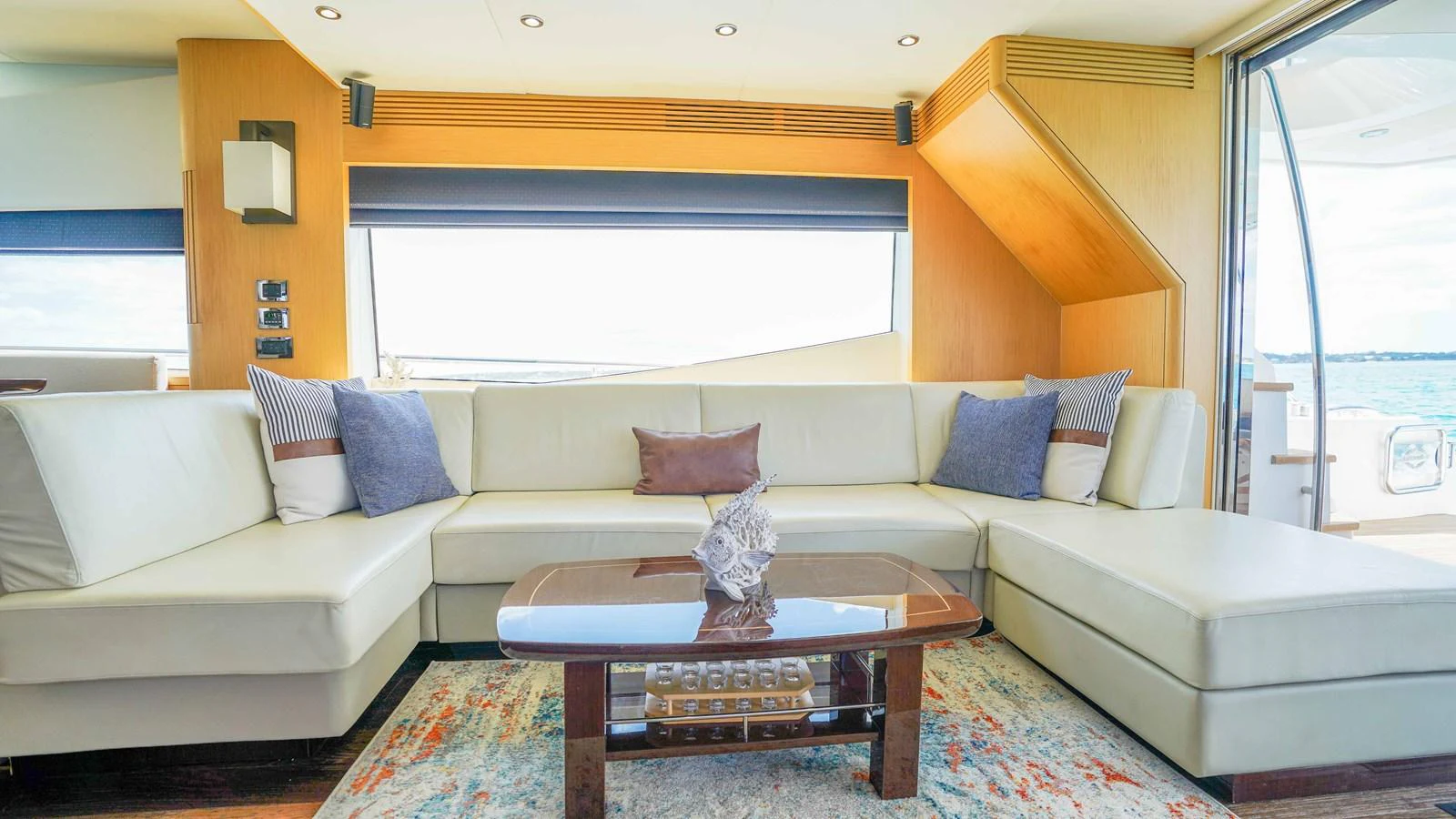 a living room with a couch and a coffee table aboard DADDY'S $ Yacht for Sale