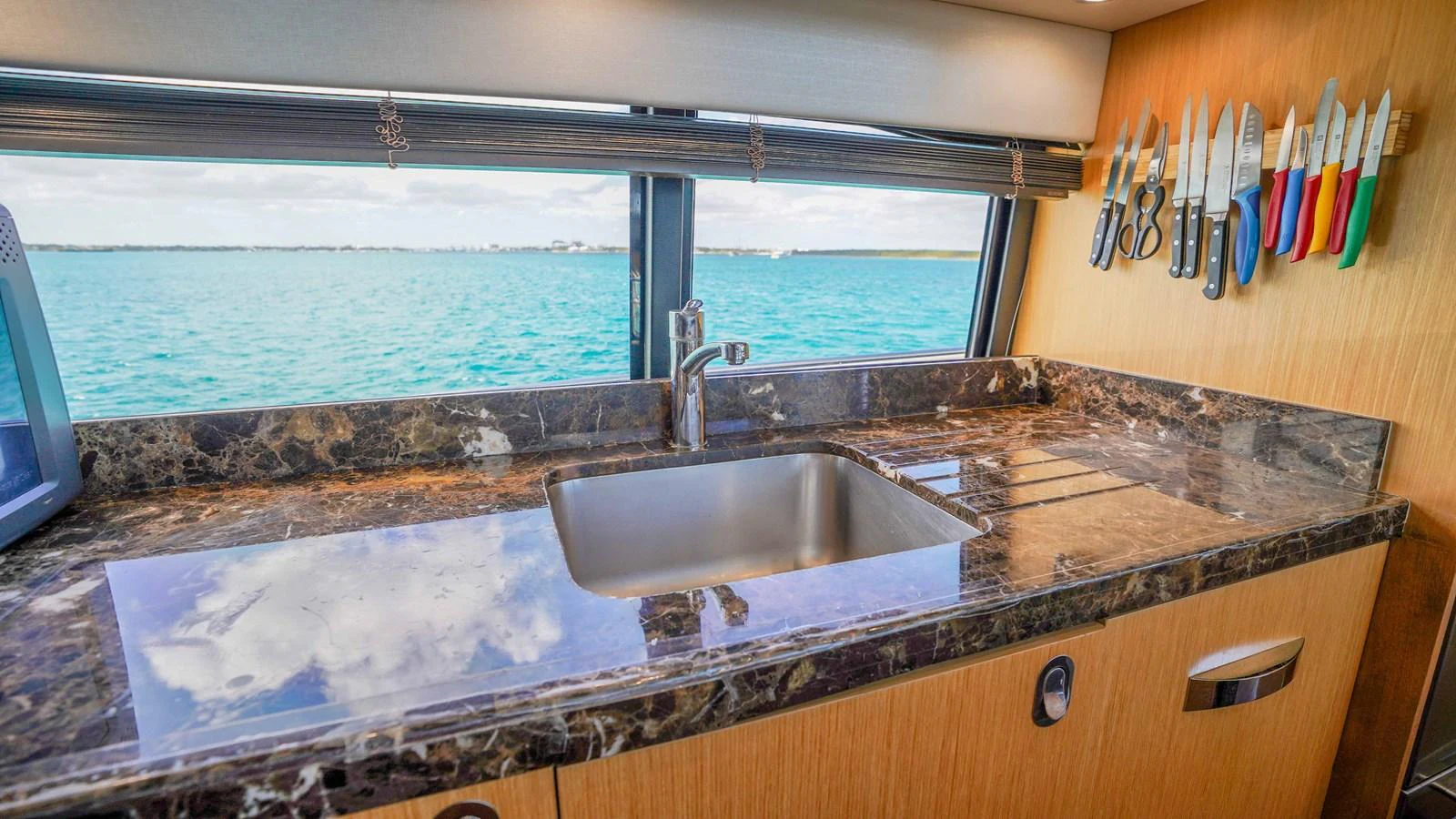 a sink and a window aboard DADDY'S $ Yacht for Sale