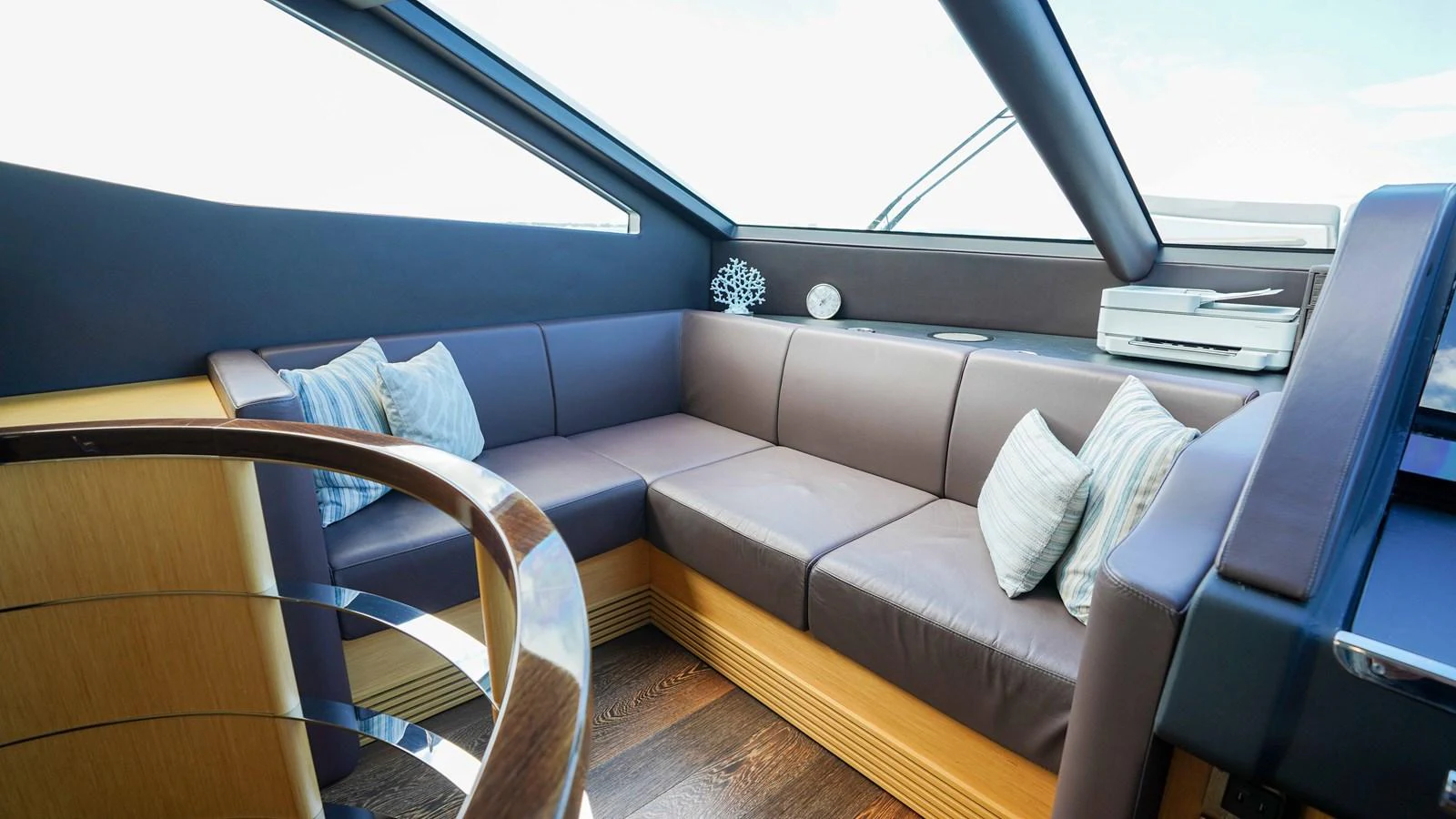 a couch in a car aboard DADDY'S $ Yacht for Sale