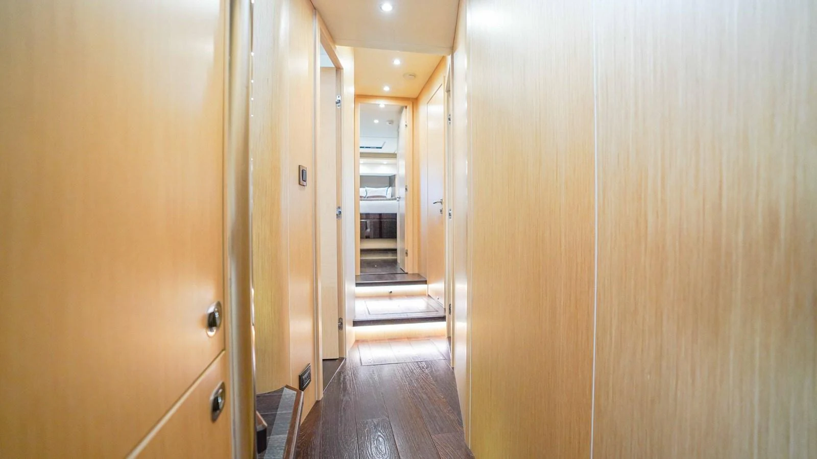 a hallway with a wood door aboard DADDY'S $ Yacht for Sale