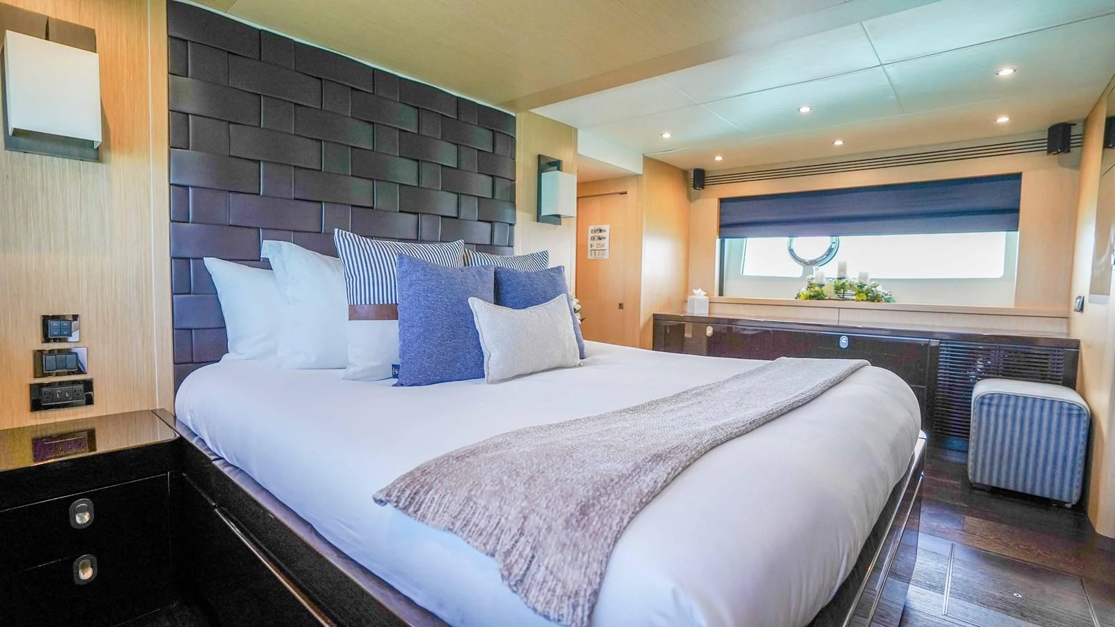 a large bed in a room aboard DADDY'S $ Yacht for Sale