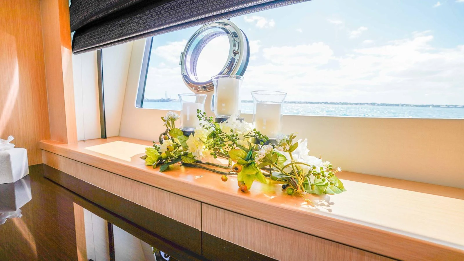 a window with a plant on it aboard DADDY'S $ Yacht for Sale