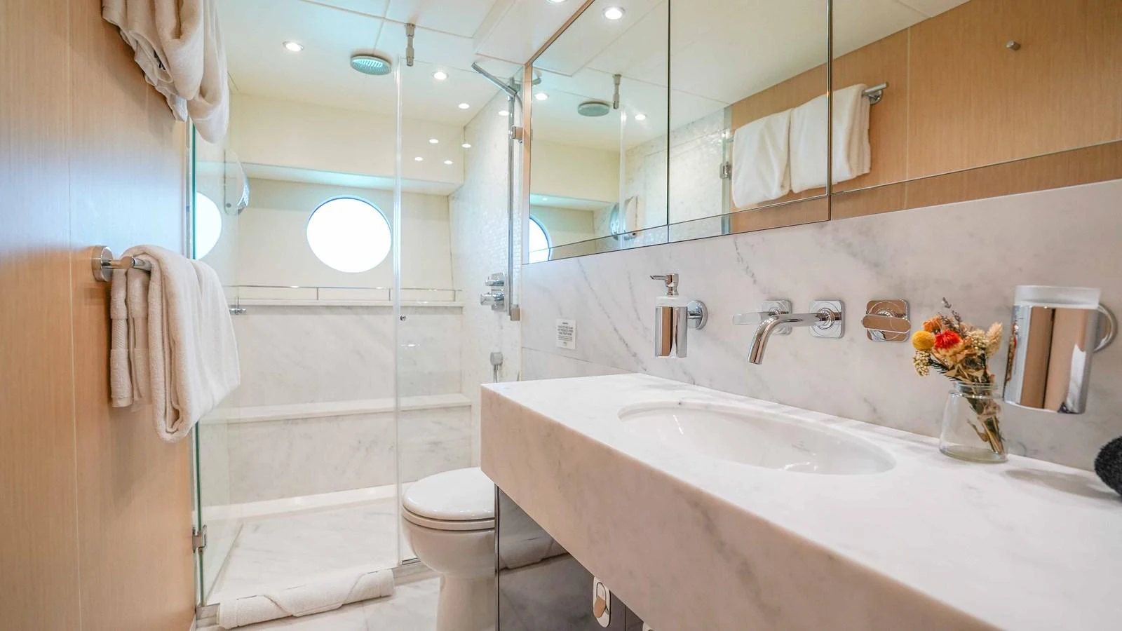 a bathroom with a sink toilet and bathtub aboard DADDY'S $ Yacht for Sale