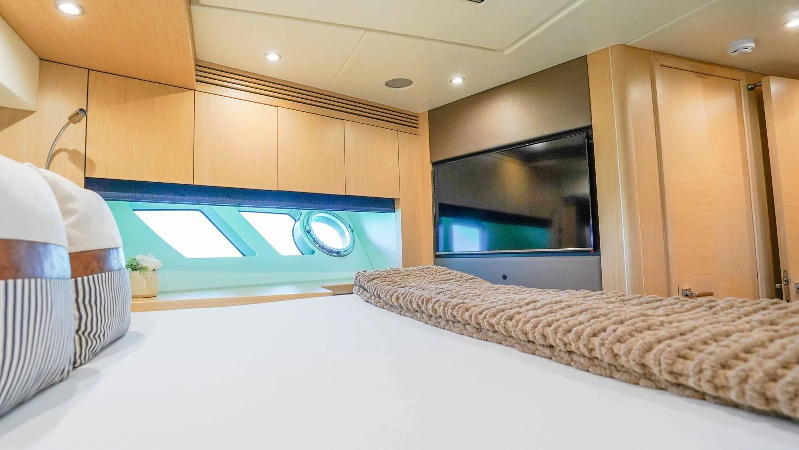 a bed in a room aboard DADDY'S $ Yacht for Sale