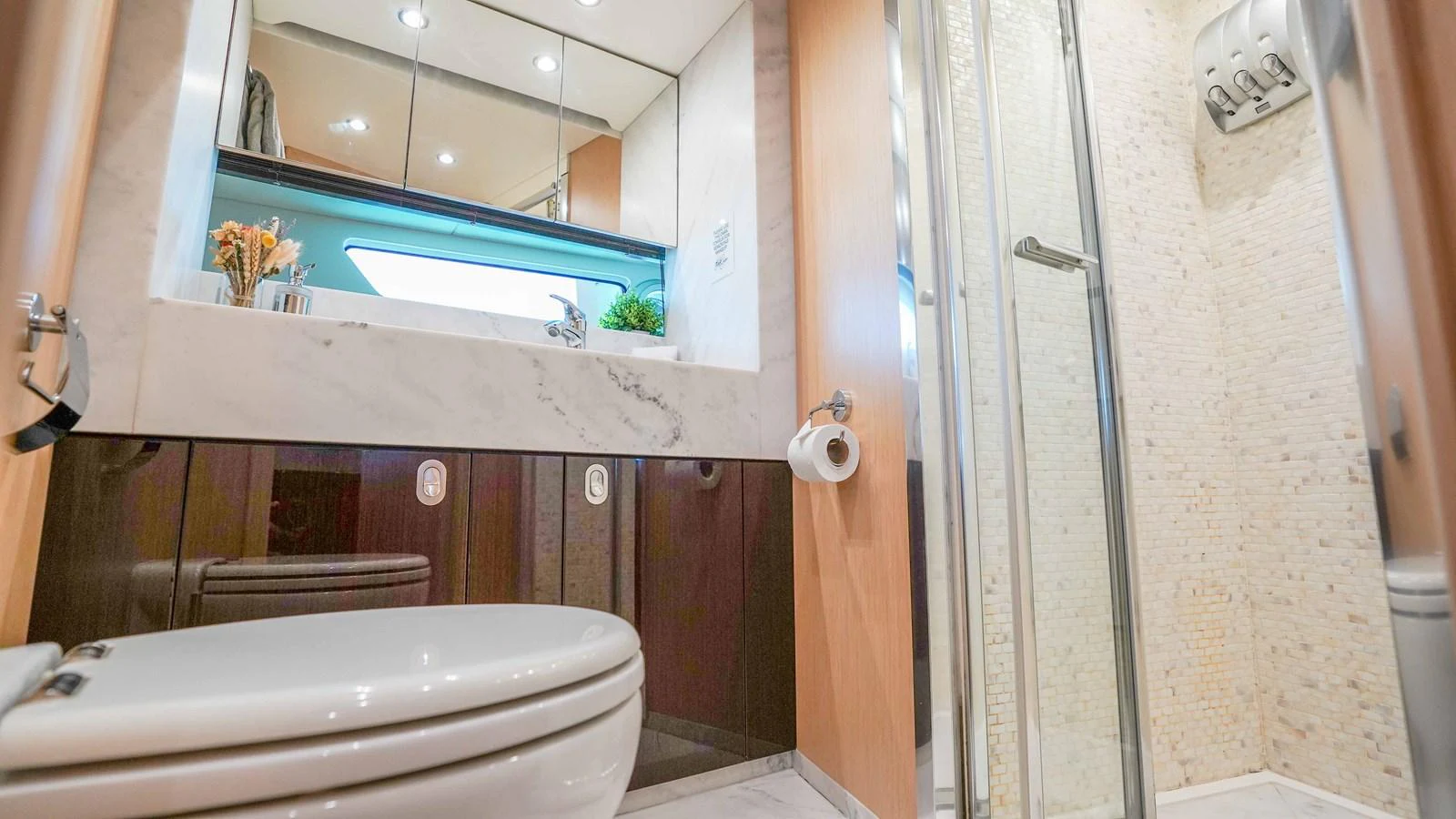 a bathroom with a glass door aboard DADDY'S $ Yacht for Sale