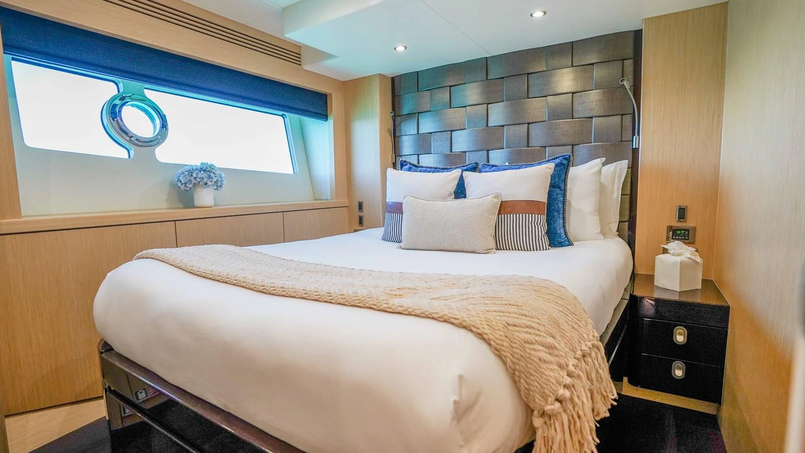a bed with white sheets aboard DADDY'S $ Yacht for Sale
