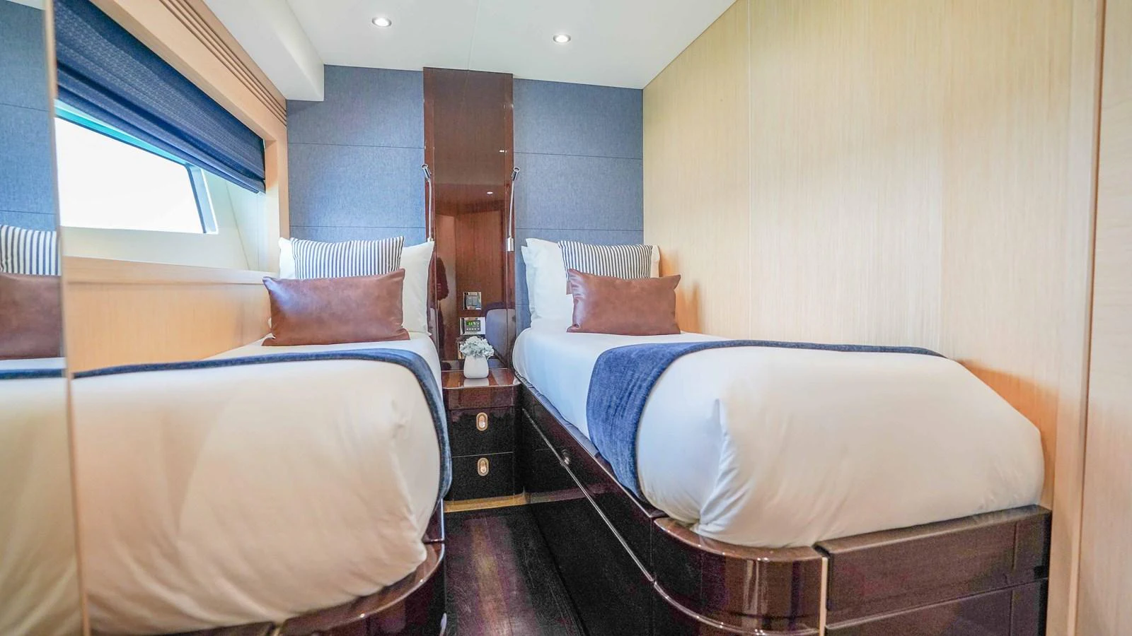 a couple of beds in a room aboard DADDY'S $ Yacht for Sale