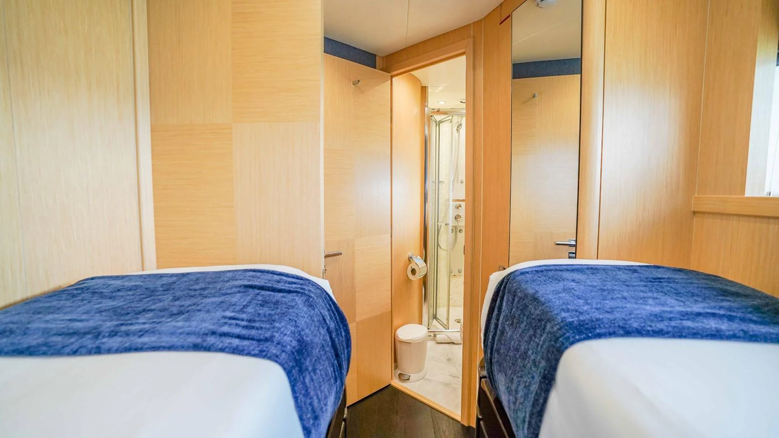 a room with two beds aboard DADDY'S $ Yacht for Sale