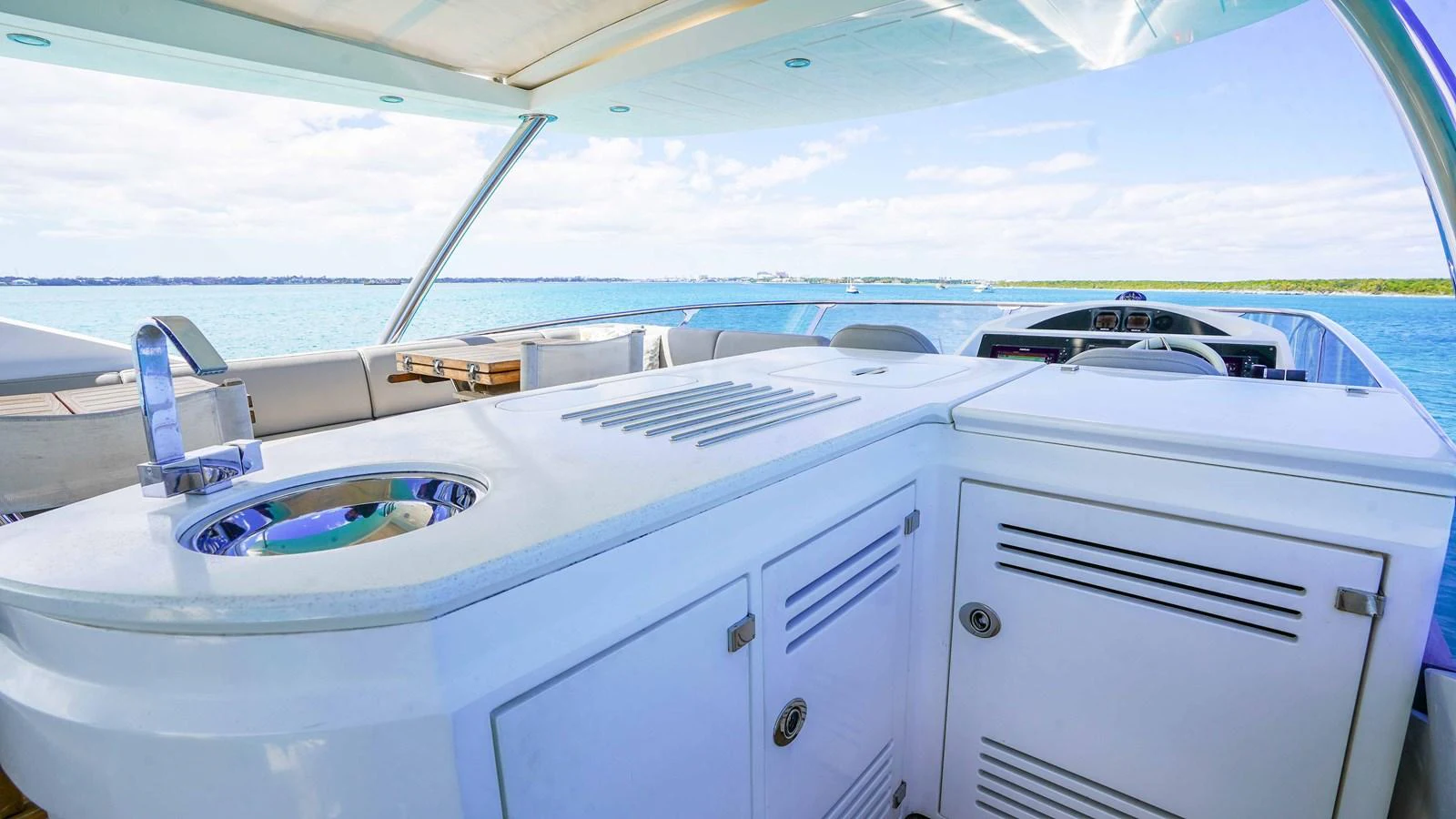 the inside of a white car aboard DADDY'S $ Yacht for Sale