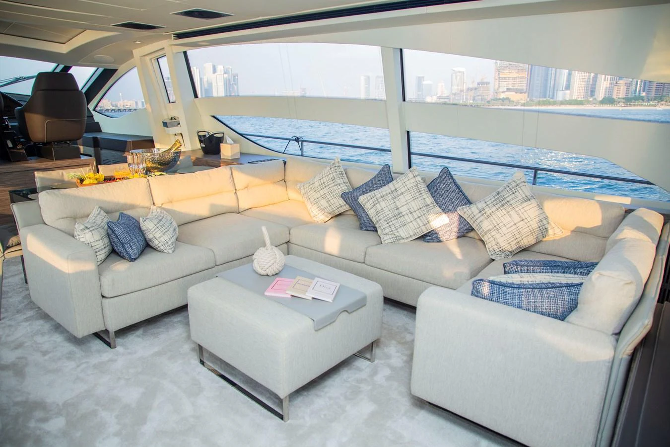 a living room with a large window aboard STRAGA Yacht for Sale