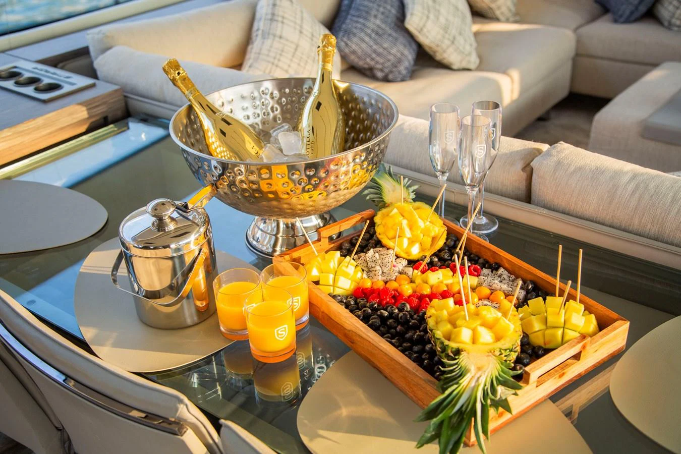 a table with food and glasses aboard STRAGA Yacht for Sale