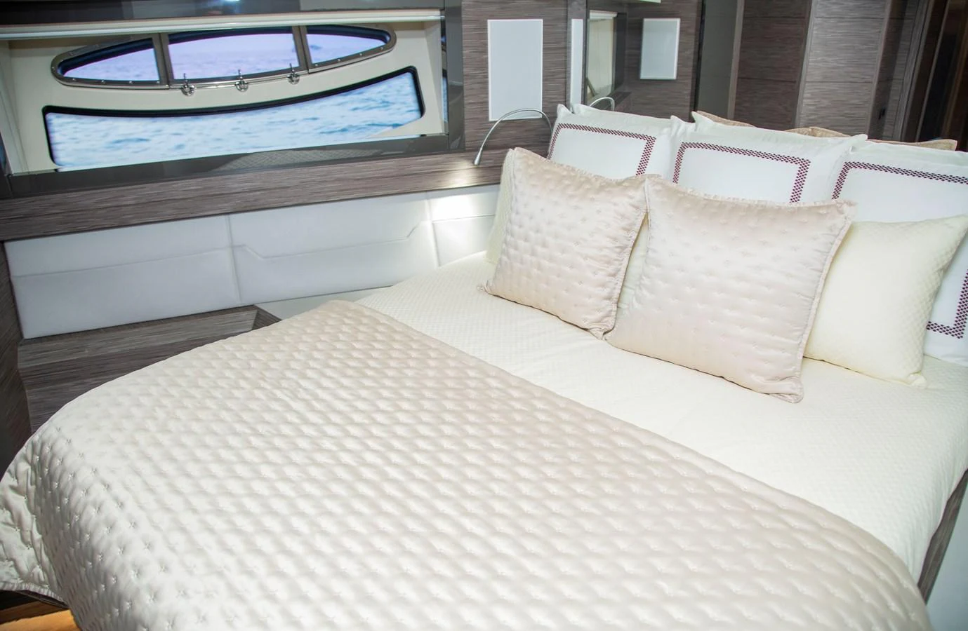 a bed with pillows aboard STRAGA Yacht for Sale
