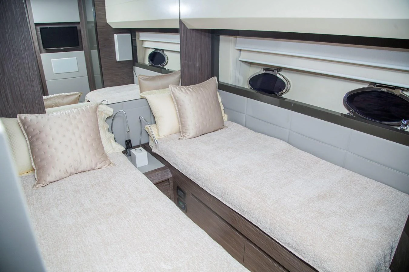 a room with a bed and a television aboard STRAGA Yacht for Sale