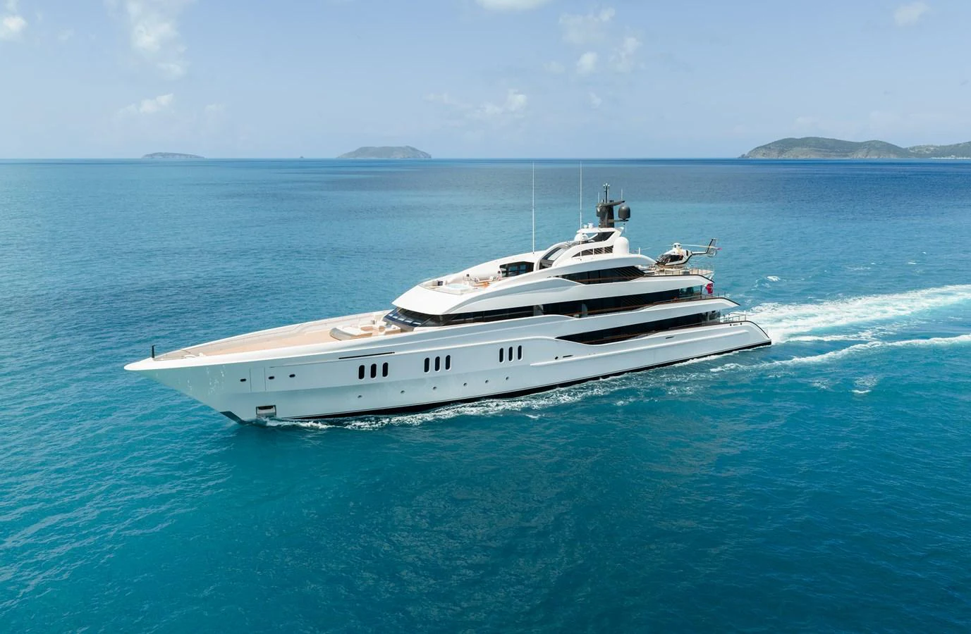 a white boat in the water aboard VANISH Yacht for Sale