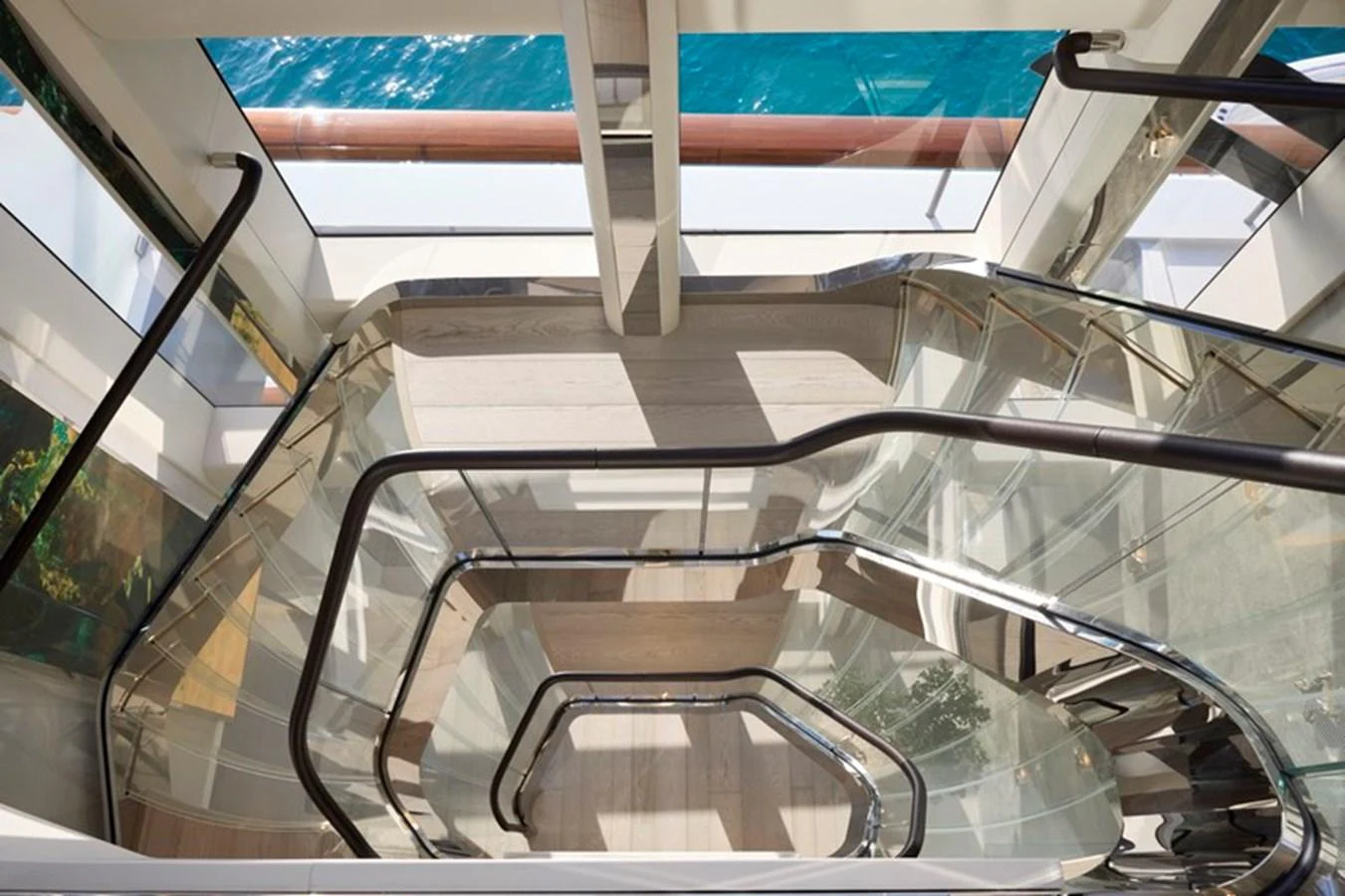 a close-up of a staircase aboard VANISH Yacht for Sale