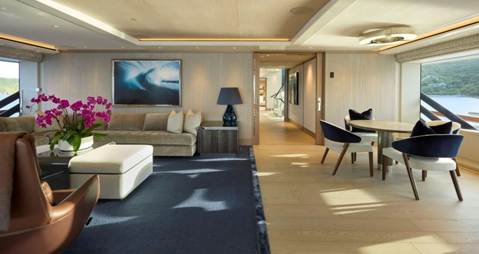 a living room with a large screen aboard VANISH Yacht for Sale