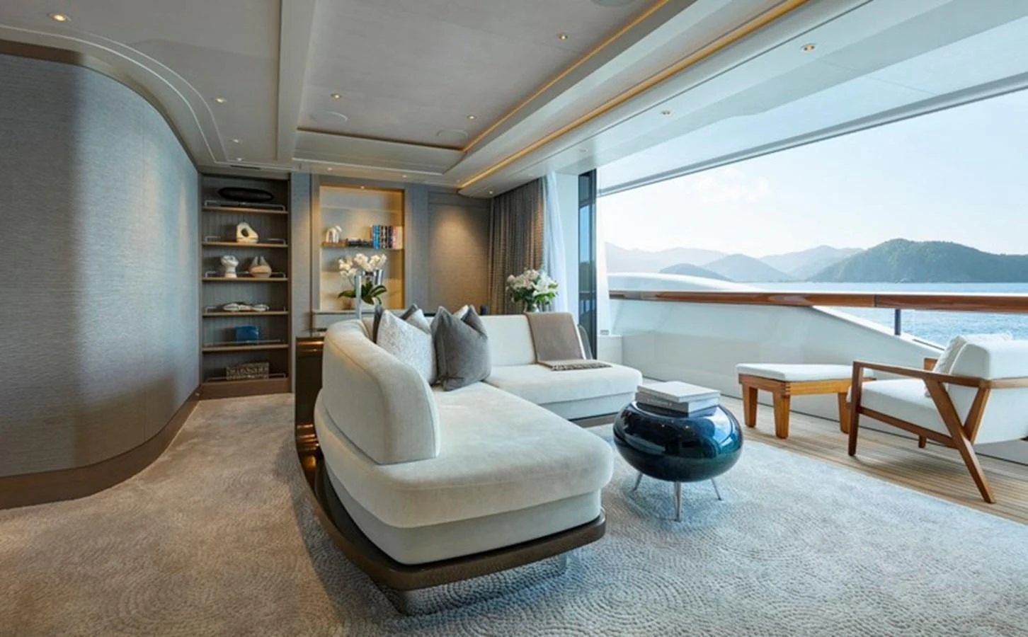 a living room with a large window aboard VANISH Yacht for Sale