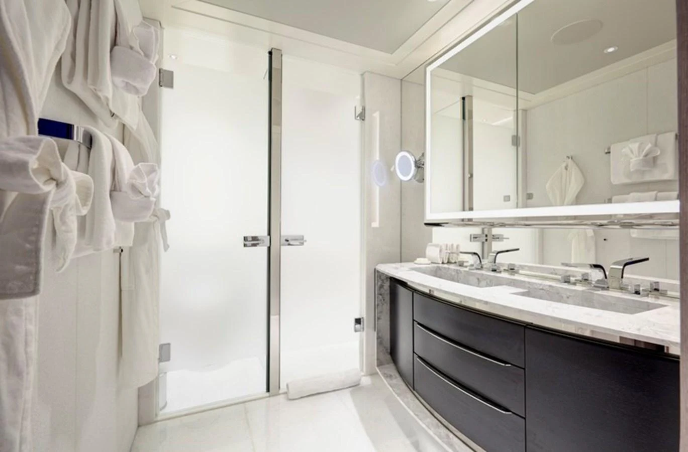 a bathroom with a sink and a mirror aboard VANISH Yacht for Sale