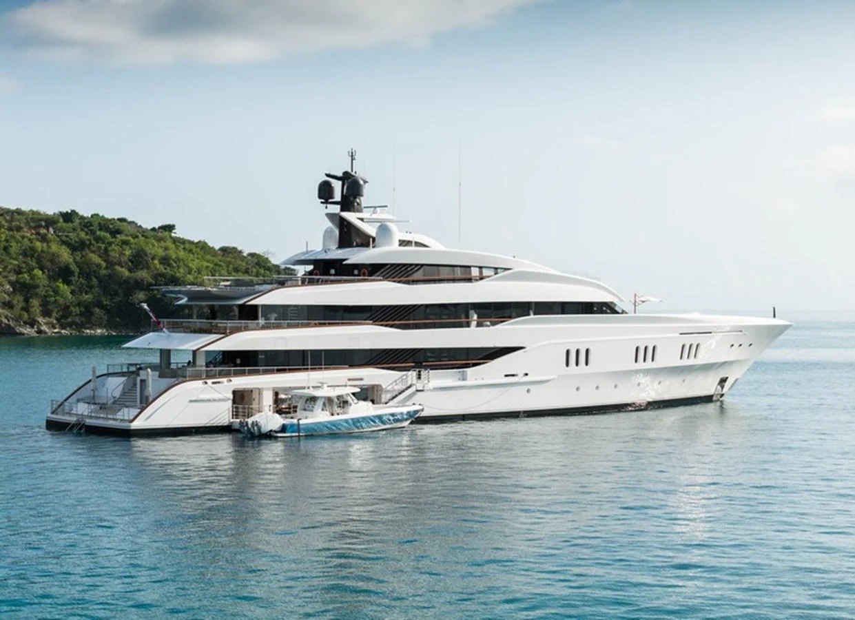 a large white yacht in the water aboard VANISH Yacht for Sale