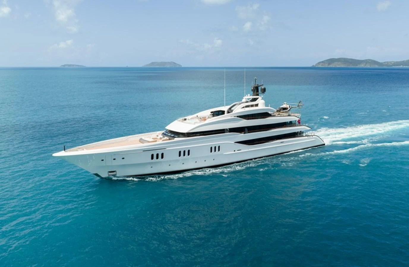 a white boat in the water aboard VANISH Yacht for Sale