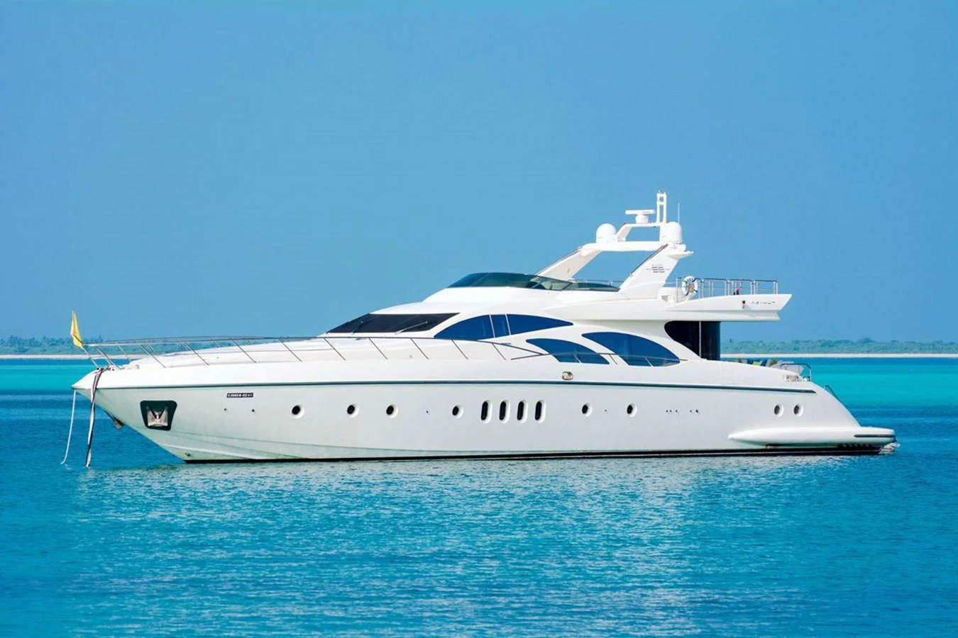 a white yacht on the water aboard AZIMUT 98 LEONARDO Yacht for Sale