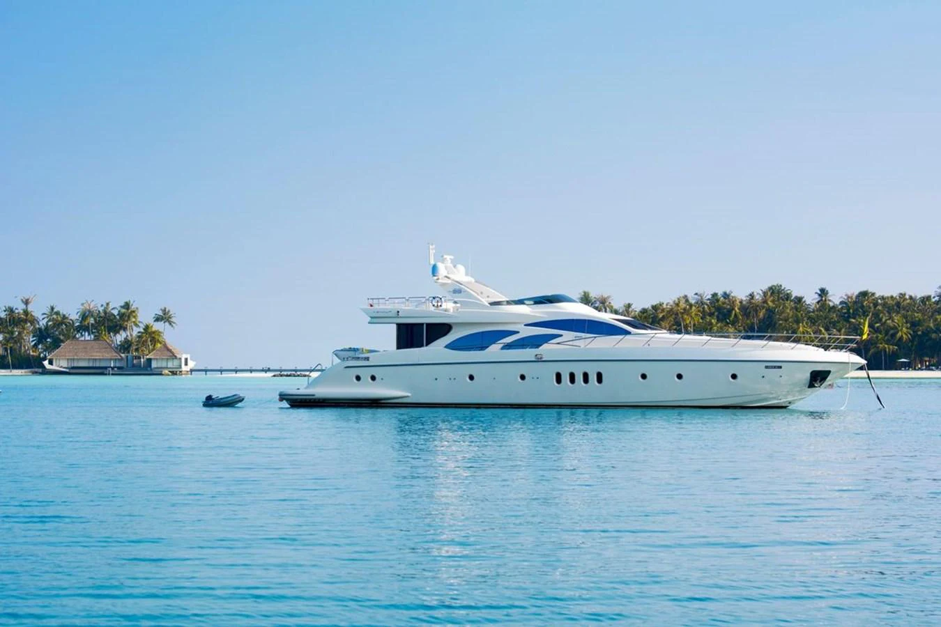 a white boat on the water aboard AZIMUT 98 LEONARDO Yacht for Sale