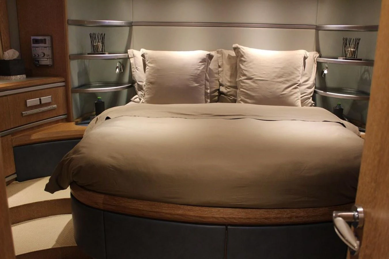 a bed with white sheets aboard AZIMUT 98 LEONARDO Yacht for Sale