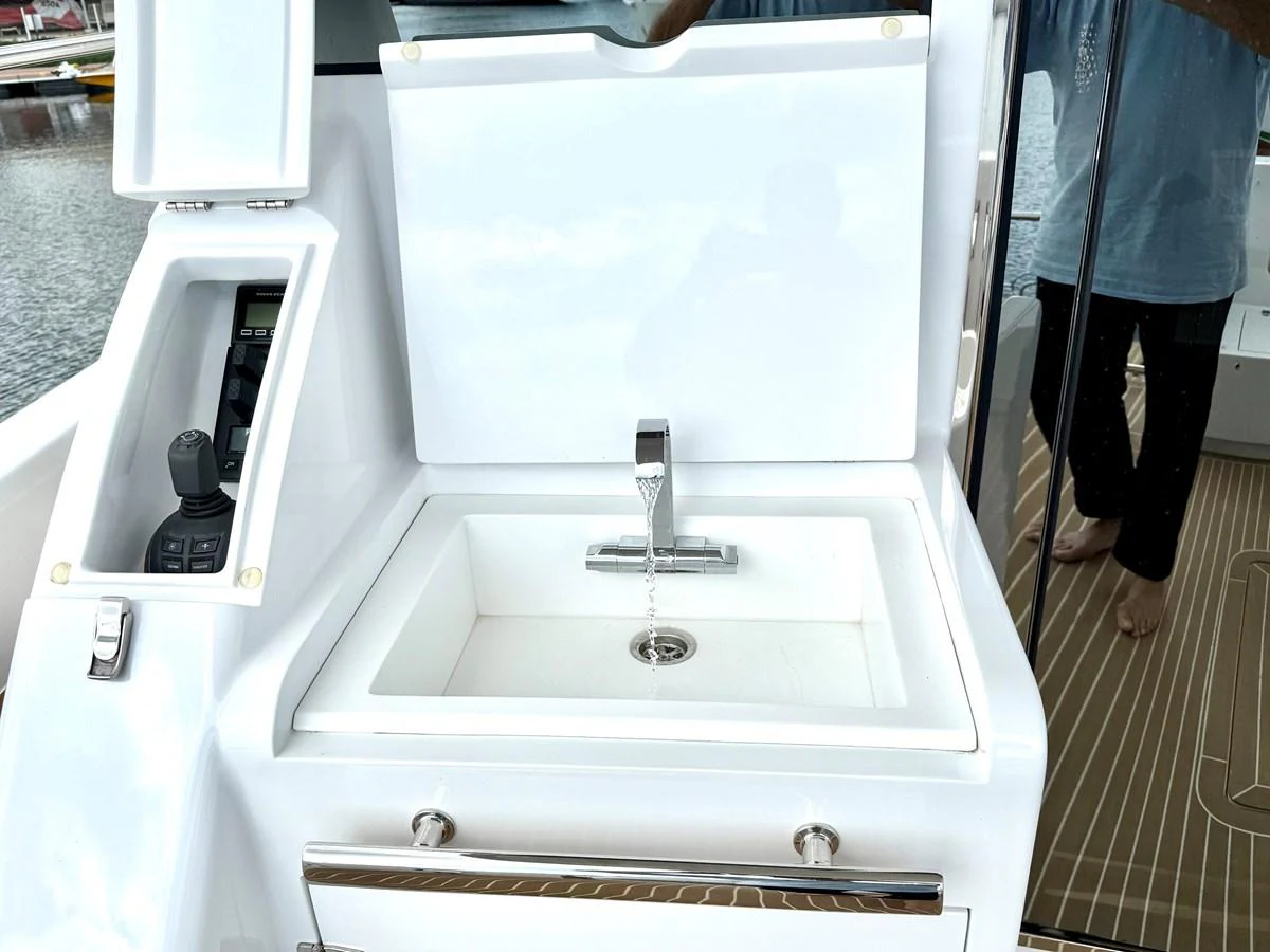 a white machine with a white panel aboard SEA AT LAST Yacht for Sale