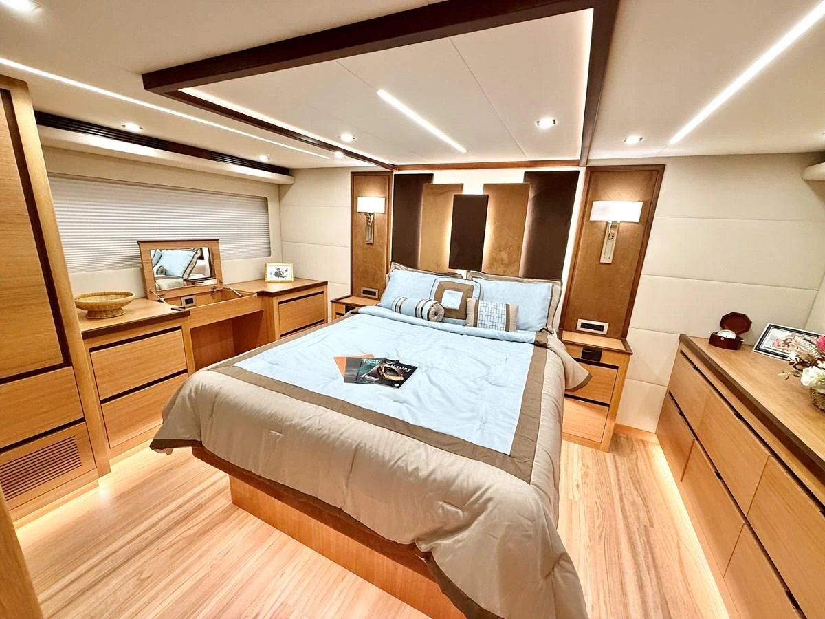 a bedroom with a bed aboard SEA AT LAST Yacht for Sale