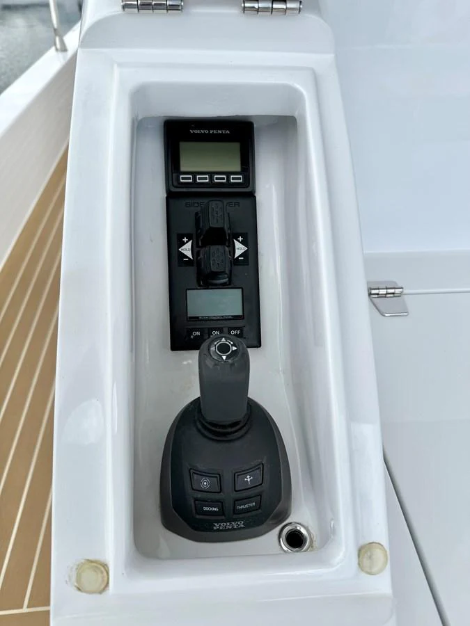 a white machine with a black dial aboard SEA AT LAST Yacht for Sale